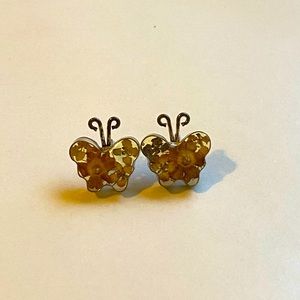 Butterfly earrings with dried flowers inside